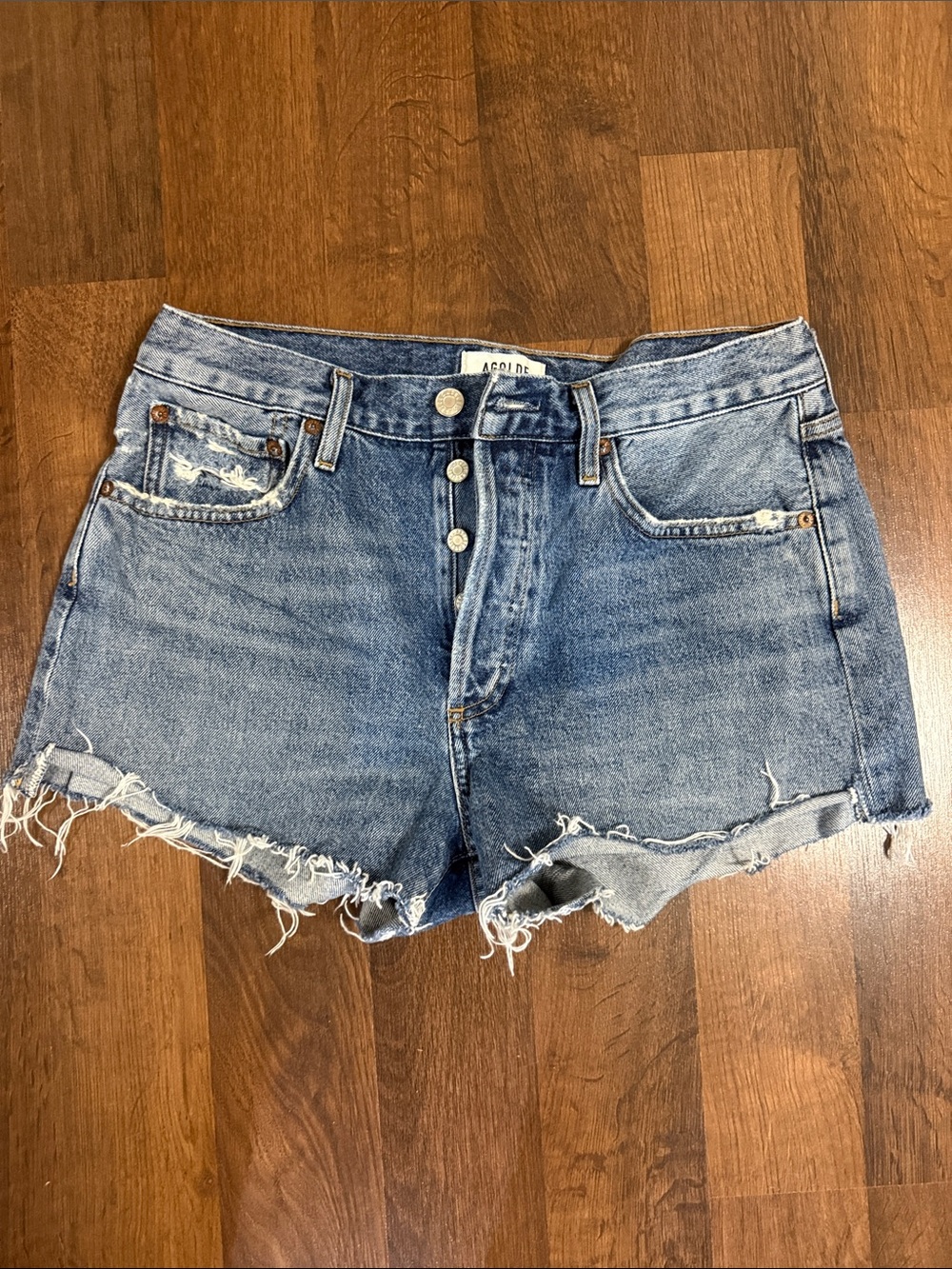 Agolde Medium Blue Distressed Denim Cutoff Shorts